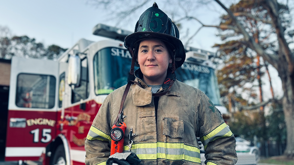 Bennett, ready for action, represents the grit and camaraderie of Charlotte Fire. Every call is different, but her commitment to the community never wavers.