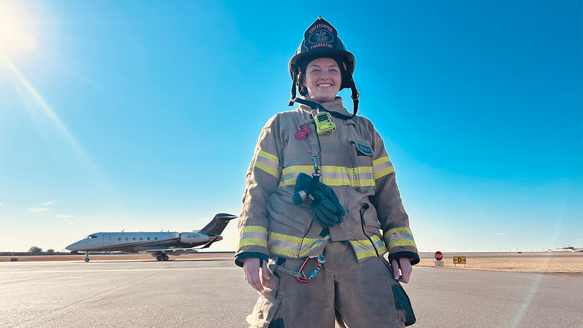 Standing on the tarmac, Swenson embraces the dynamic nature of firefighting, proving that passion and perseverance have no limits.