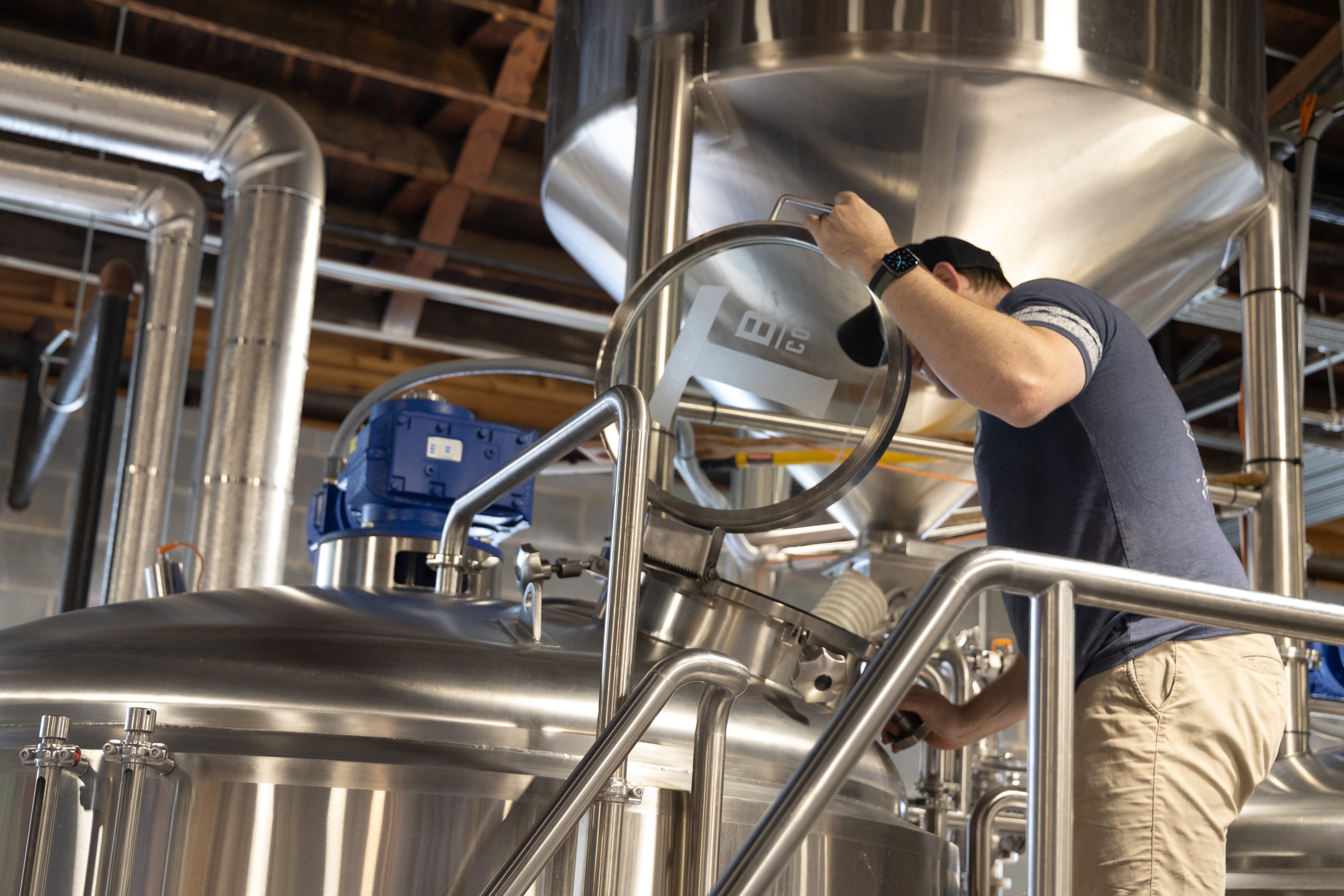 Town’s head brewer, Federico De La Torre, demonstrates the brewing process.