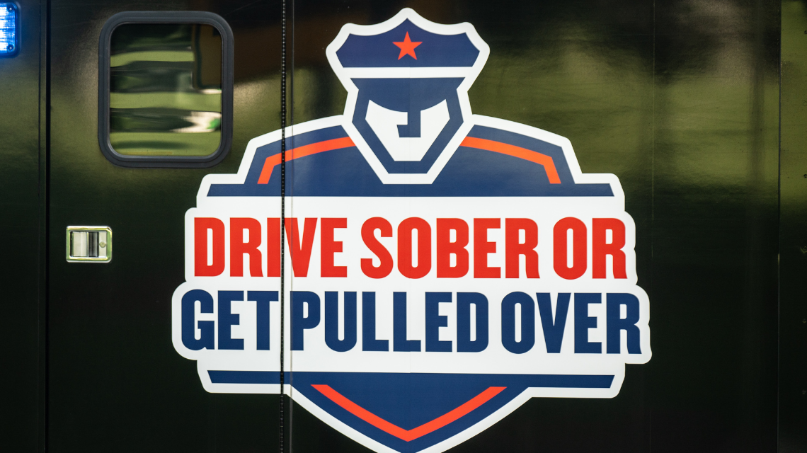 A logo for booze it or lose it campaign.