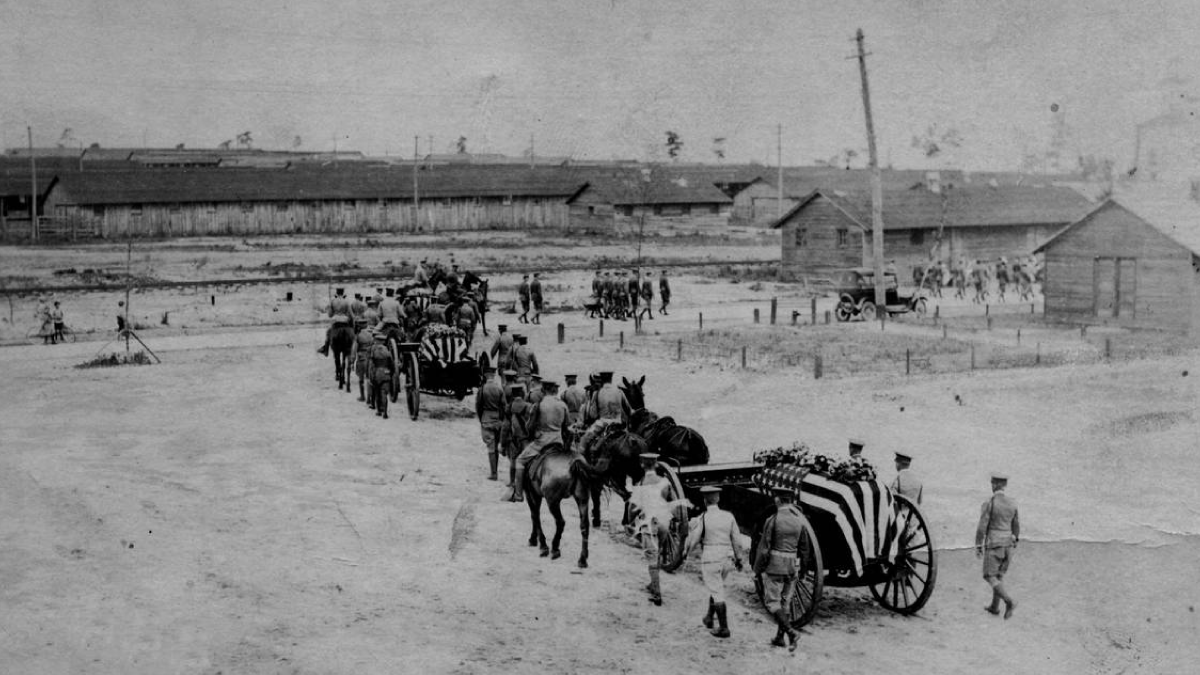 A funeral procession at Camp Greene during the height of the flu.