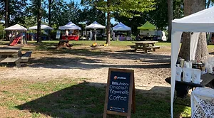 Sandwich board advertising Java Bean at farmers' market.