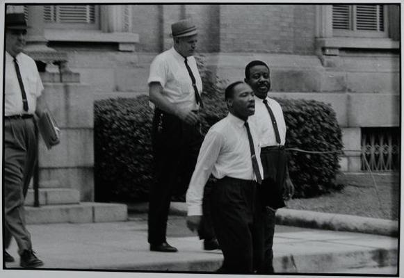 King and Abernathy being escorted from the courthouse to the jail in Albany, Georgia in 1962.