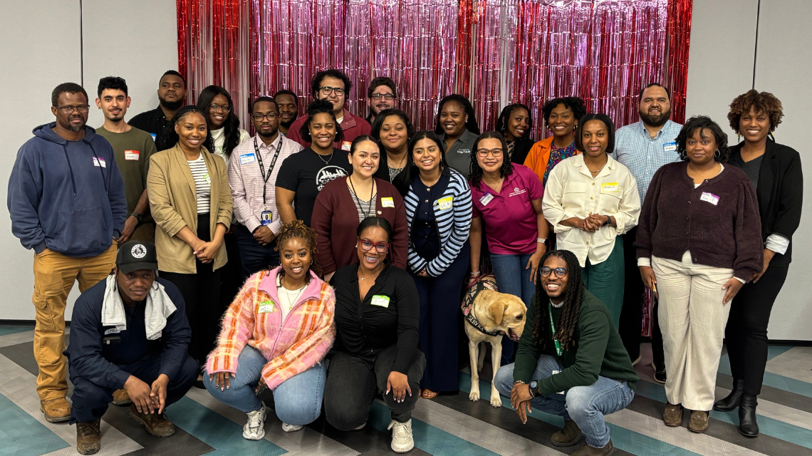 Members of Young Professionals Network pose together for a photo at an event.