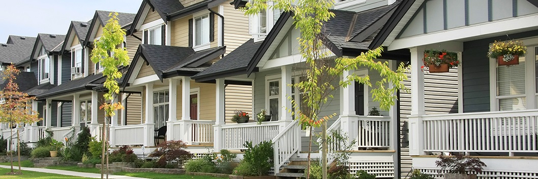 Line of houses on city street.