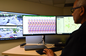 CDOT engineer performing signal timing adjustments using a time space diagram
