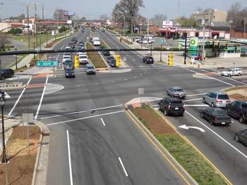 A drone image of the intersection of South Boulevard and Woodlawn Road, facing west on Woodlawn