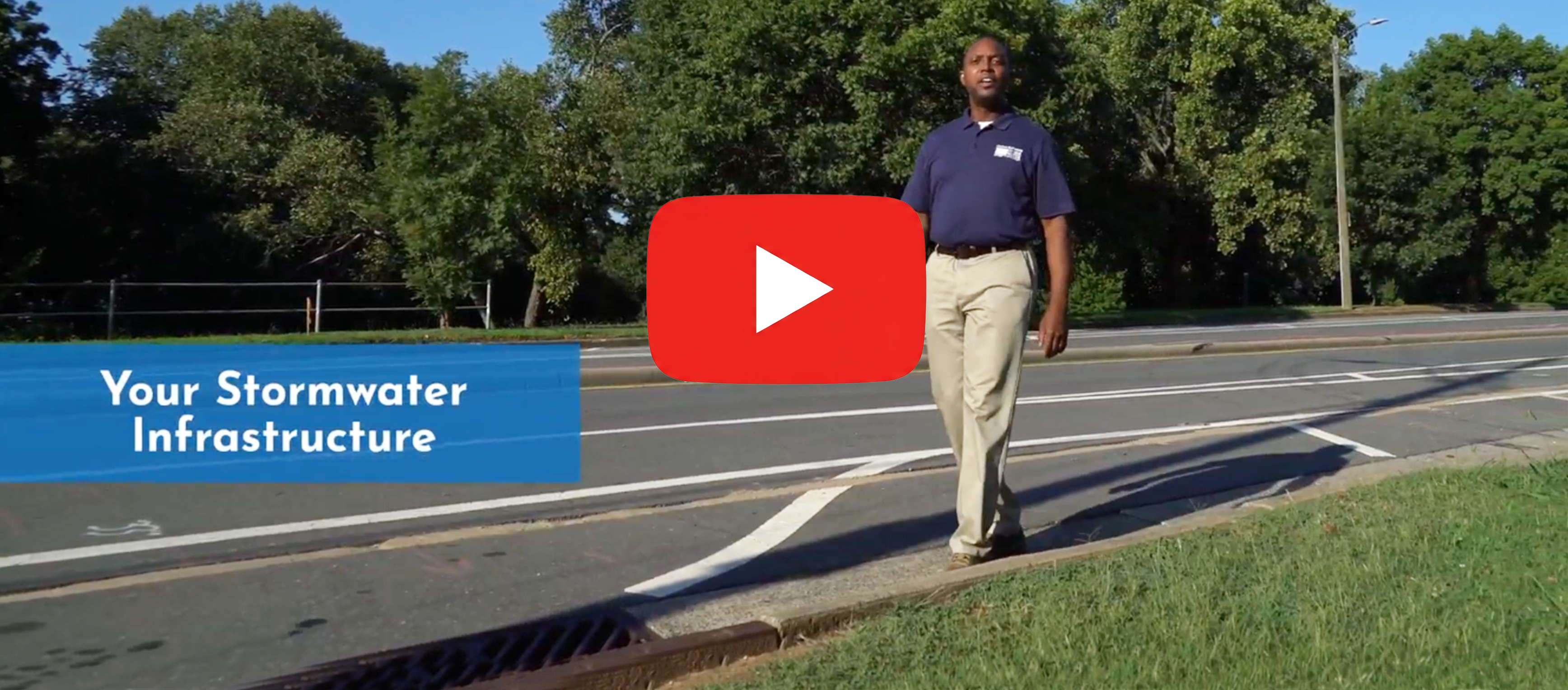 Your-Stormwater-Infrastructure.-Man-walking-near-a-road.png