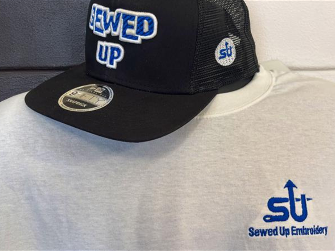 A t-shirt with the sewed up embroidery emblem